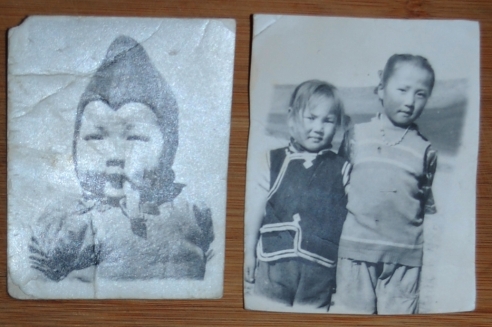 Left: Dashka as an infant, exact age unknown. Right: Dashka, age 7 with her sister Oyuntugs, age 4.